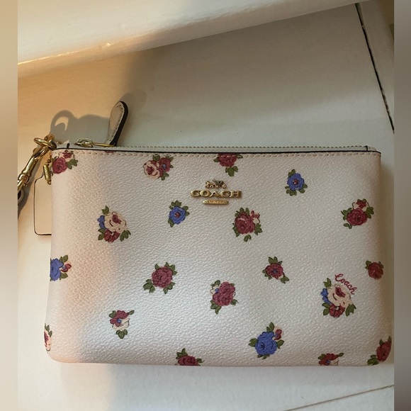 Authentic Coach Wristlet - floral NWOT never used - Picture 2 of 5
